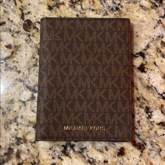 Michael Kors Handbags - New Michael Kors passport wallet!